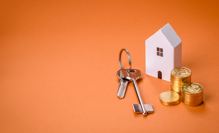 A golden key with a dollar sign handle inserted into a keyhole, symbolizing wealth access or financial security.