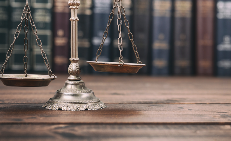 scales of justice books in the background