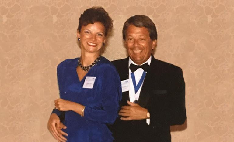 Pat Peacock holds his wife Virgina Engel in a photo from 1989