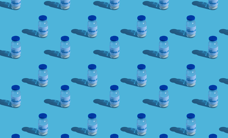lines of vaccine vials on blue background