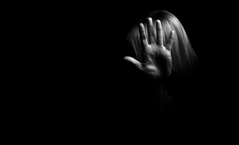 womans-hand-showing-gesture-stop