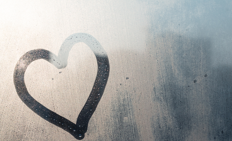 heart on window condensation