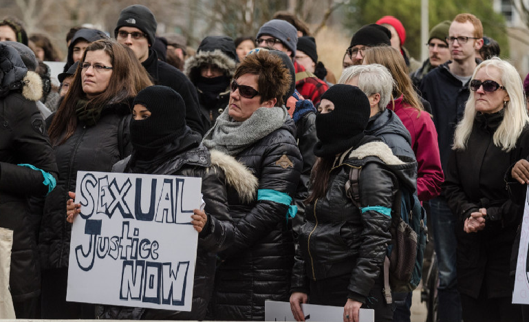 people at a me too protest
