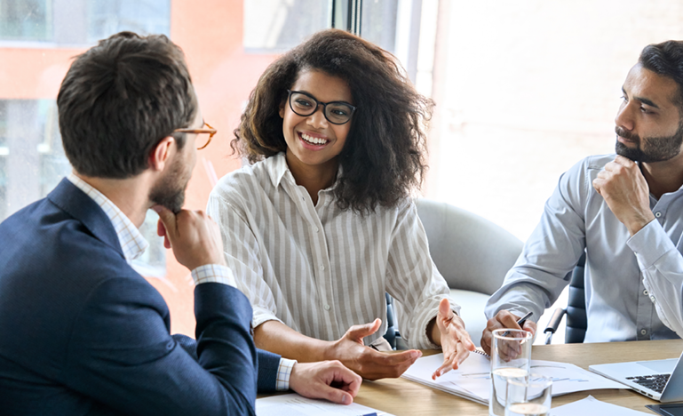 professionals at a board table